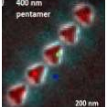 Hybridization between Nano Cavities for Polarimetric Color Sorter at the Sub-Mic